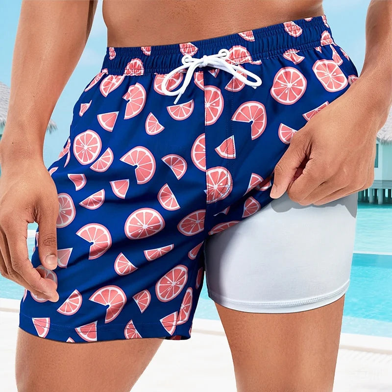 Mannen | Zwemshort met tropische print en zijsplitzoom