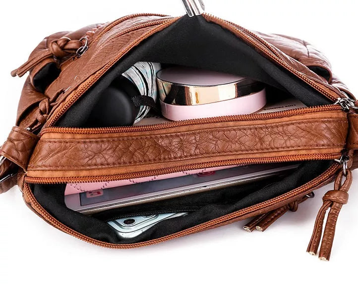 Vrouwen | Tas met lange riem en subtiele details
