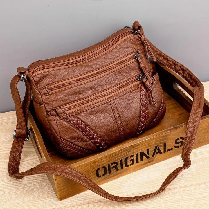 Vrouwen | Tas met lange riem en subtiele details